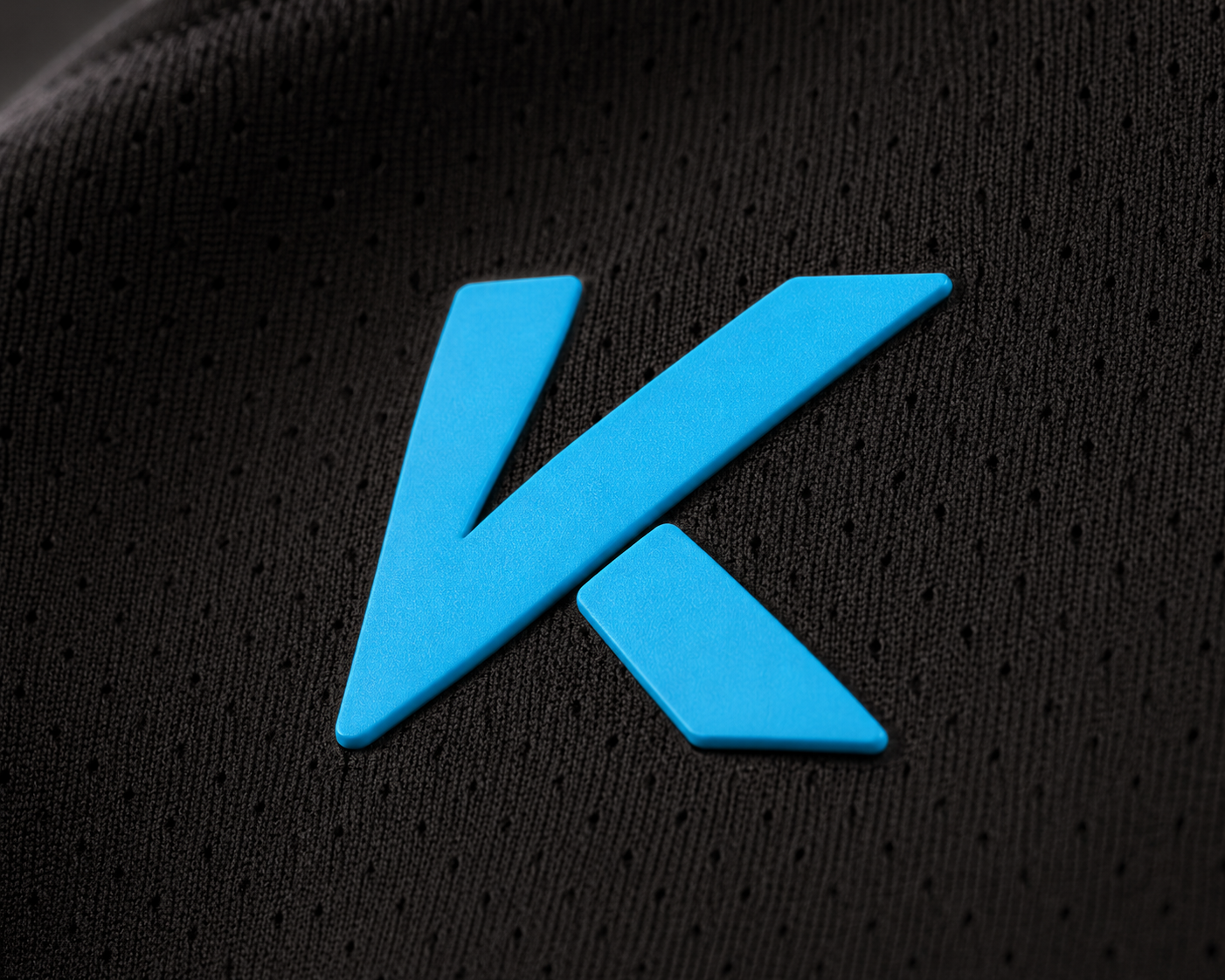 Logo Kaven Sports sobre la tela del jersey Vaqueros de Agua Prieta 2026 negro, detalle